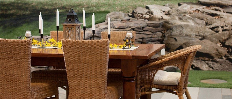 outdoor table and rock wall