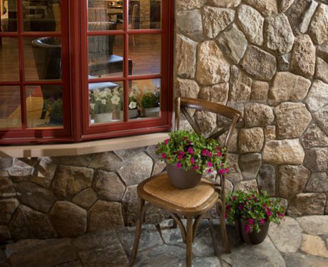 outdoor stone patio and home