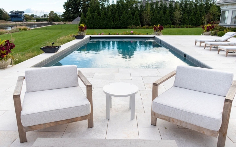 Limestone Pool Patio With Light Natural Tones And Cool Underfoot Surface