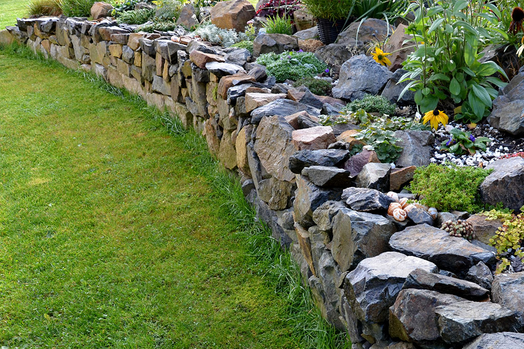 Stacked stone sales retaining wall