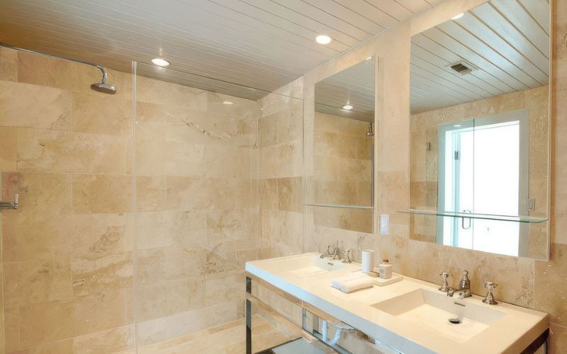 Travertine bathroom with honed finish.
